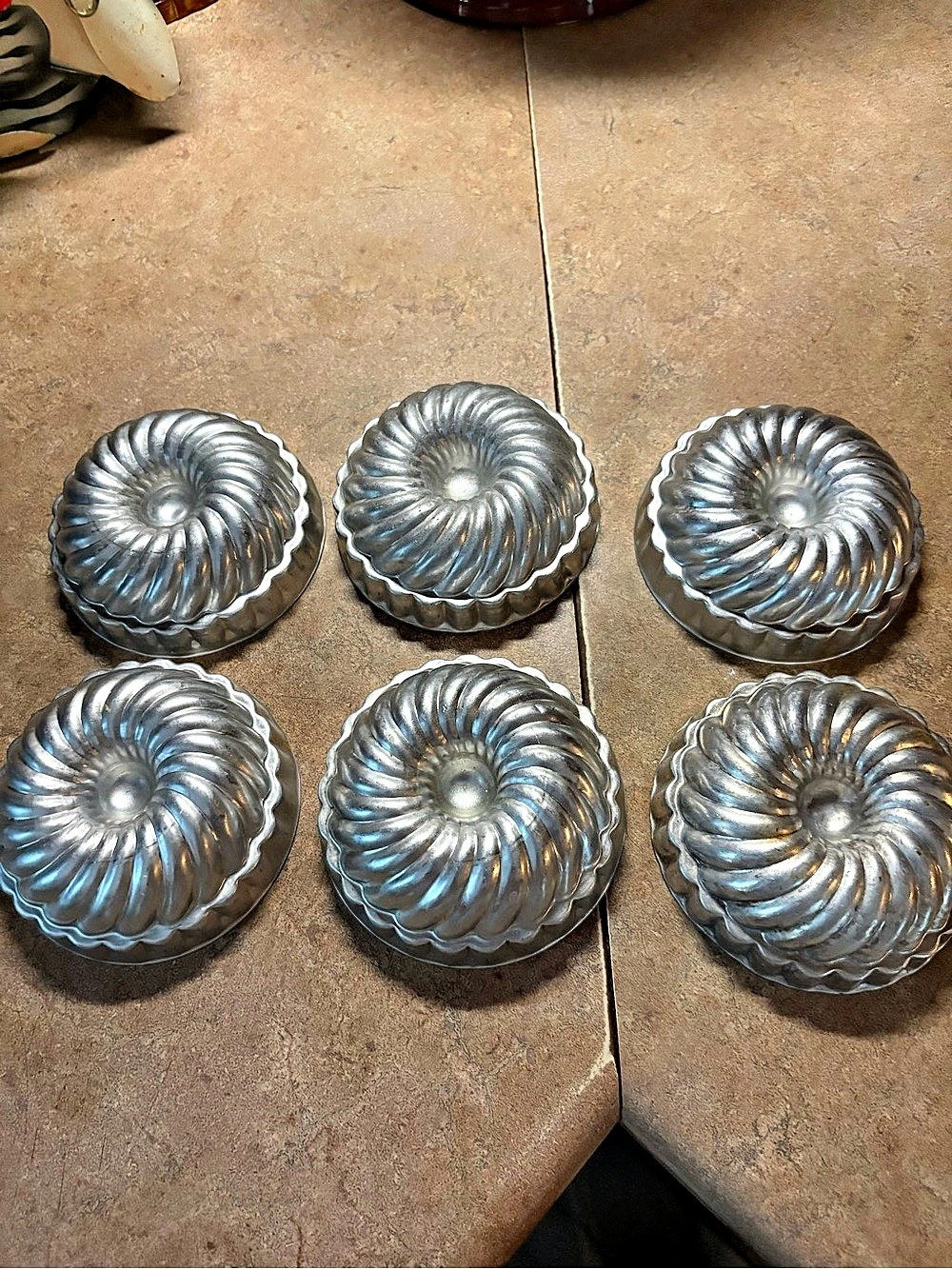 Set of 6 ice cream, aspic, jello mold, mini Bundt swirl pans, etc.